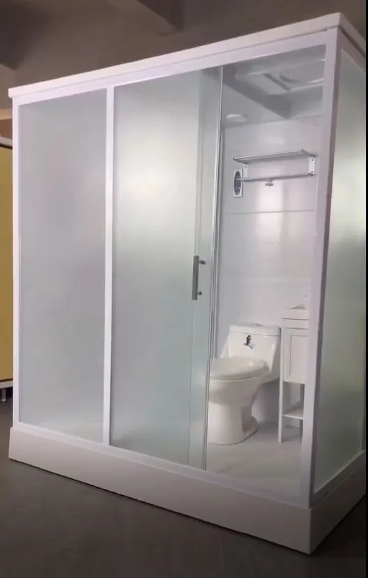 Unidad de baño integrado completo con mampara de vidrio, inodoro y lavamanos